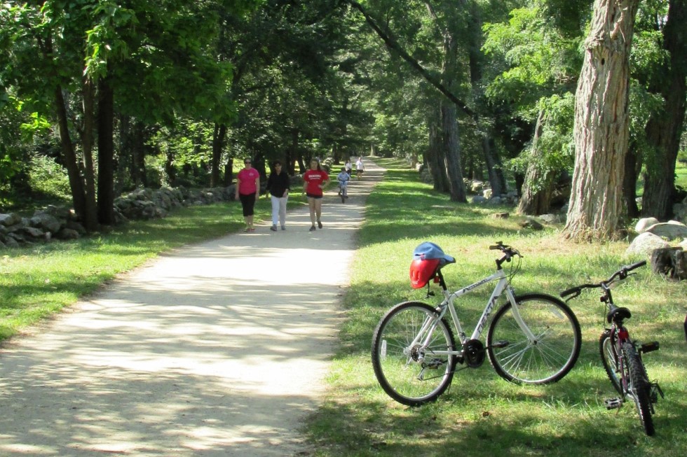 Bikes and walkers enjoy Battle Road Trail at Minute Man National Historical Park. 